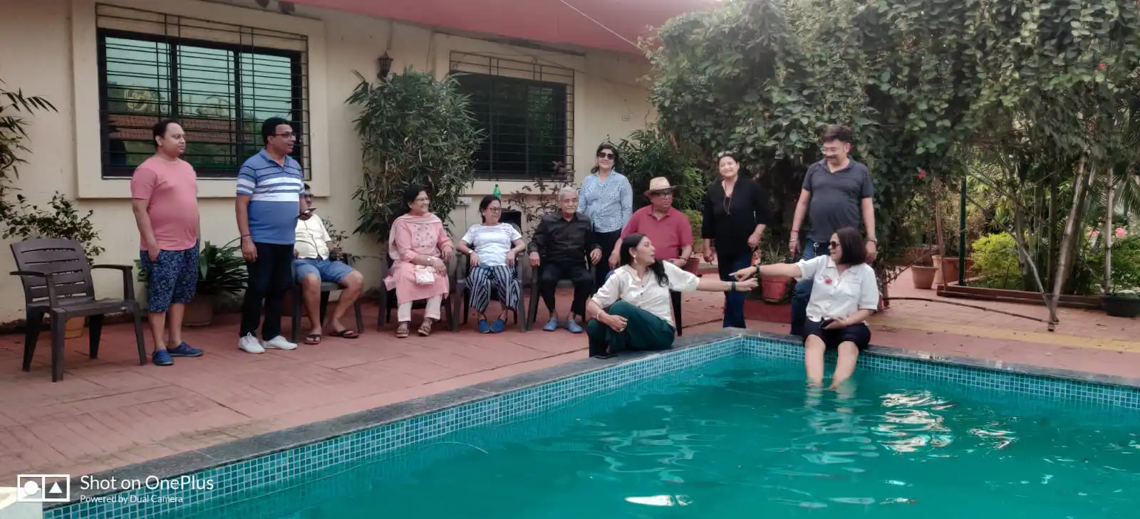 Family At Swimming Pool